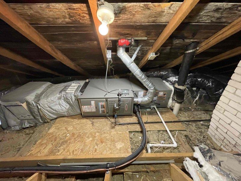 Completed full HVAC system installation including 70,000 BTU furnace and 2-ton air conditioning unit with exterior condenser placement in left side yard. Installed new ductwork in attic space with proper insulation and secured all connections with metal strapping, connected furnace to existing air handler, and programmed Sensi digital thermostat for system control. All electrical and mechanical reconnections completed, system tested and operational, permits obtained prior to installation.