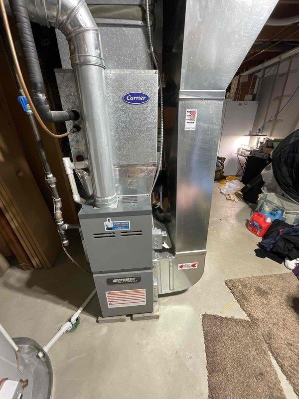 Provided comprehensive estimate for complete HVAC system replacement at tri-level residence with 27-year-old non-functioning air conditioning unit. Evaluated existing Carrier propane furnace and associated equipment located in basement mechanical room, including current ductwork configuration, air handler, and all connecting components. Assessed installation requirements for new system to replace aging equipment, taking into account existing infrastructure, ductwork compatibility, and proper sizing for propane fuel source.