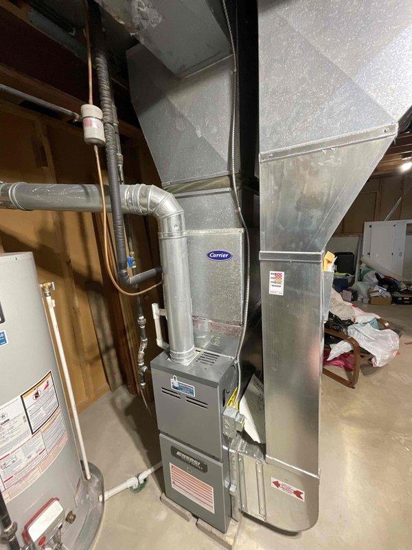 Provided comprehensive estimate for complete HVAC system replacement at tri-level residence with 27-year-old non-functioning air conditioning unit. Evaluated existing Carrier propane furnace and associated equipment located in basement mechanical room, including current ductwork configuration, air handler, and all connecting components. Assessed installation requirements for new system to replace aging equipment, taking into account existing infrastructure, ductwork compatibility, and proper sizing for propane fuel source.