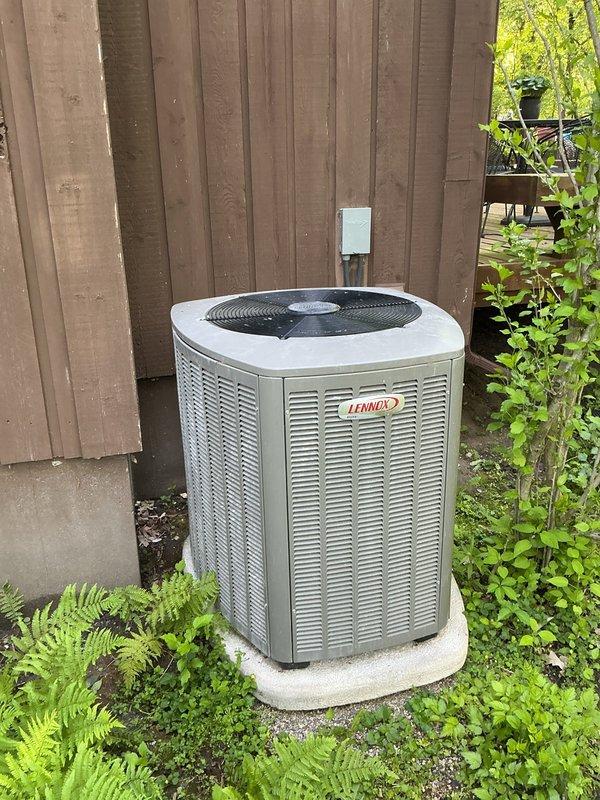 Responded to service call regarding concern about cement debris potentially falling into outdoor Lennox heat pump unit. Performed thorough inspection of one-year-old unit including removal of top fan grille to examine fan blade assembly, motor, and interior cabinet for foreign material or damage. Found no cement, debris, or obstructions present in fan assembly or condenser coil area. Verified unit operational integrity, confirmed proper fan motor function, and cleared system for normal operation.