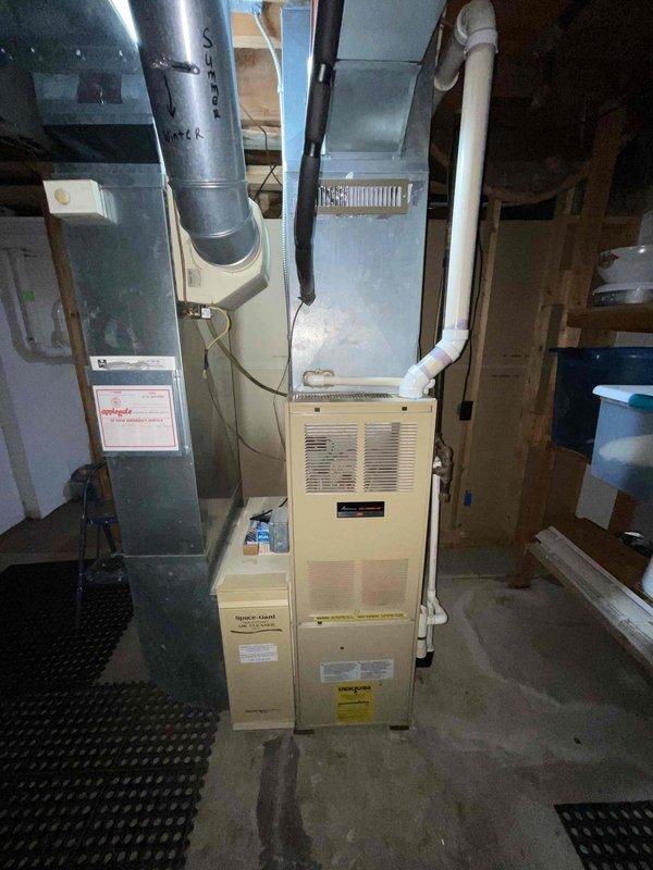 Provided comprehensive estimate for complete HVAC system replacement of 30-year-old air conditioning unit and furnace. Existing AC unit completely non-operational and both systems at end of service life. Assessed current equipment configuration including furnace with humidifier, ductwork, condensate drainage system, and electrical panel connections to determine replacement specifications and installation requirements for expedited system changeover.