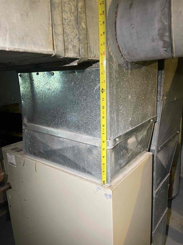 Completed full system estimate for a 30-year-old natural gas forced air HVAC system in a colonial-style residence that was not operational. Documented existing equipment conditions including aged furnace and air conditioning components, assessed ductwork transitions and connections, evaluated electrical controls and gas piping infrastructure, and provided comprehensive replacement recommendations for the complete heating and cooling system.