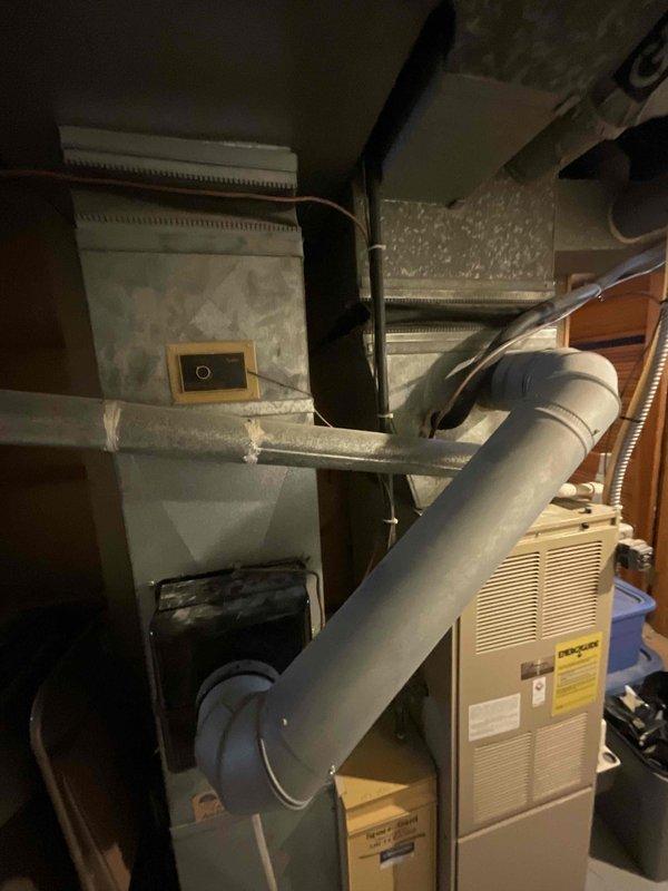 Responded to service call for four-year-old central air conditioning system not cooling with suspected refrigerant leak. Performed comprehensive system evaluation including inspection of indoor furnace unit, ductwork connections, and outdoor condensing unit to identify cooling failure cause. Documented equipment conditions and provided full system replacement estimate per BOGO promotion eligibility.