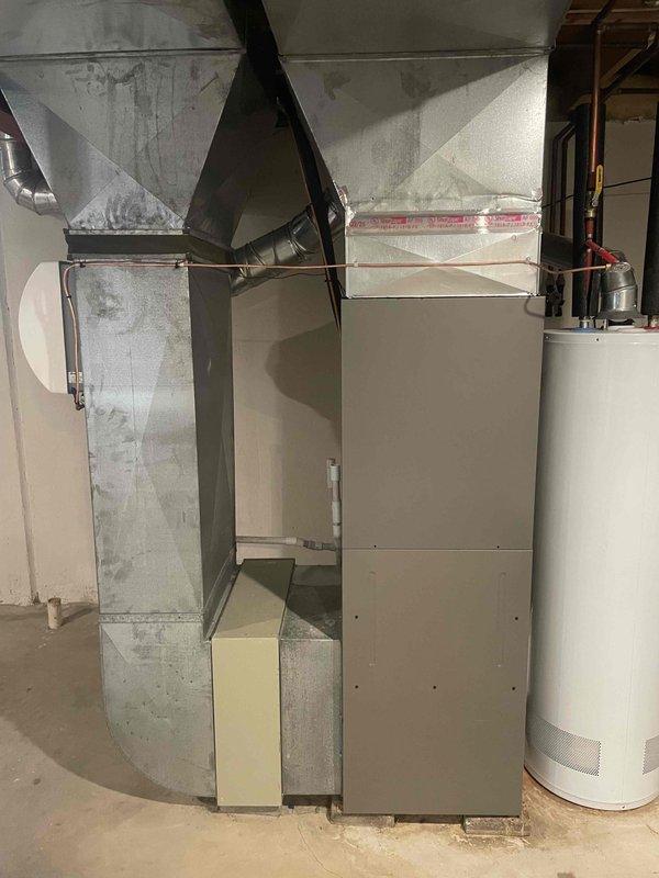 Successfully installed a 2.5 ton Lennox air conditioning unit (Model CK40CT-48C-71) with matching evaporator coil in the right side yard. The outdoor condensing unit was positioned and reconnected to the existing indoor air handler system, with all refrigerant lines, electrical connections, and condensate drainage properly installed per manufacturer specifications. System was charged with R-454B refrigerant, tested for proper operation, and all required mechanical and AC permits were obtained prior to installation.