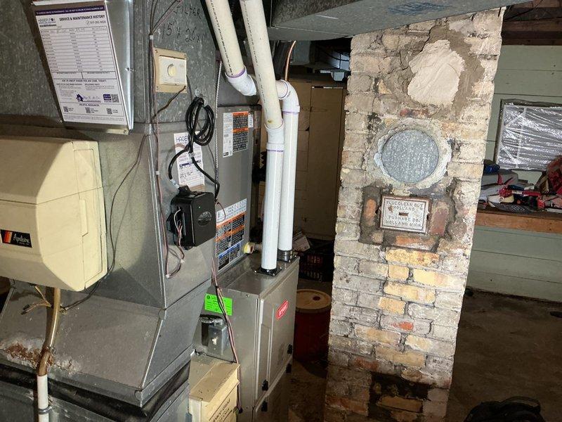 Successfully completed installation of a 3-ton air conditioning system with evaporator coil at residential property. The outdoor condenser unit was positioned in the rear yard on a concrete pad with proper clearances, connected to weatherproof electrical disconnect box, and refrigerant lines were insulated and secured along the foundation. The indoor evaporator coil was installed in the basement mechanical room and integrated with the existing furnace system. All refrigerant lines were properly connected, system was charged to manufacturer specifications, electrical connections were completed per code, and unit was tested for proper operation and airflow.