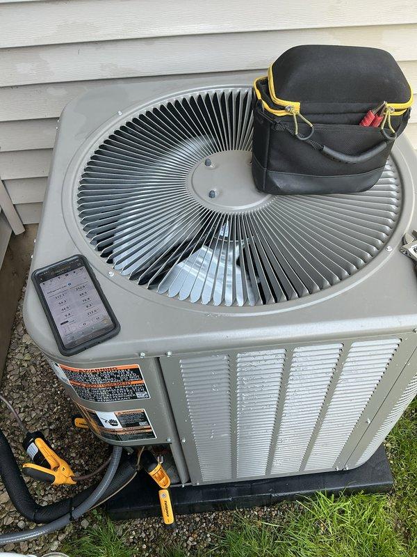 Completed annual cooling maintenance on Lennox heat pump system. Performed comprehensive inspection of outdoor condenser unit, verified proper operation of all components, and took refrigerant readings using digital gauges. Unit operating within normal parameters with no deficiencies identified.