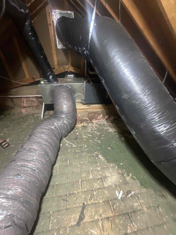 Conducted comprehensive assessment of existing HVAC system for full replacement estimate. Both air conditioning unit and heating system are approximately 2 years old and currently operational without reported malfunctions. Inspected attic and crawl space areas, documenting existing ductwork configuration including flexible ducts and metal plenum connections. Evaluated current insulation conditions and ductwork routing throughout confined spaces. Photographed installation areas to document existing system layout and accessibility for proposed equipment replacement. Provided detailed replacement estimate for complete AC and furnace system upgrade per customer request for expedited installation.