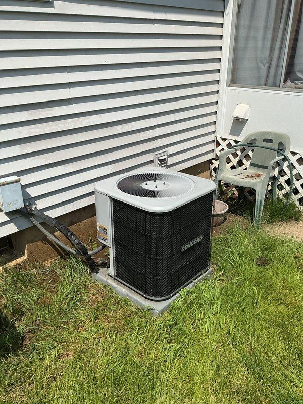 Completed seasonal tune-up on 5-year-old Comfortmaker central air conditioning system to prepare unit for cooling season. Performed comprehensive inspection of outdoor condenser unit, verified electrical connections at disconnect box, checked refrigerant levels, cleaned condenser coils, and tested system operation. All components found to be in good working condition with no issues identified; system is ready for summer operation.