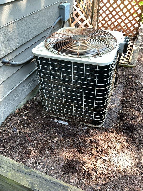 Completed annual cooling maintenance on residential outdoor condensing unit. Performed comprehensive system inspection, verified electrical readings showing 339.9 volts at the unit, cleaned condenser coils, checked refrigerant levels, and ensured all mechanical components were operating within manufacturer specifications.