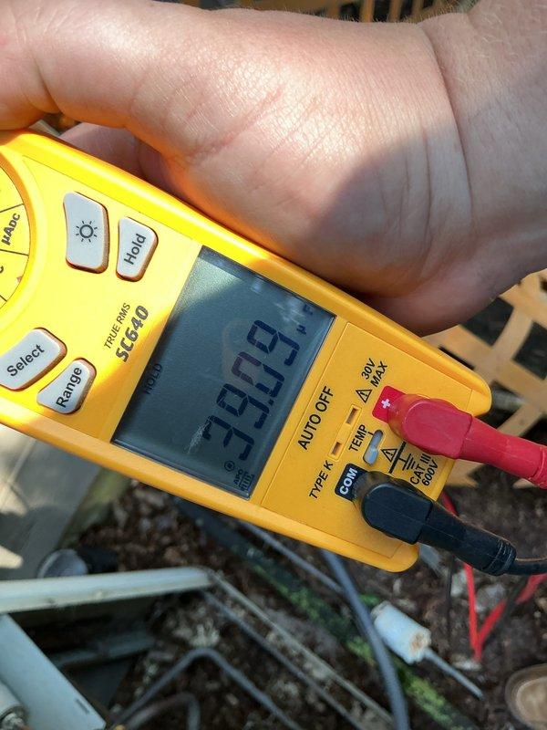 Completed annual cooling maintenance on residential outdoor condensing unit. Performed comprehensive system inspection, verified electrical readings showing 339.9 volts at the unit, cleaned condenser coils, checked refrigerant levels, and ensured all mechanical components were operating within manufacturer specifications.