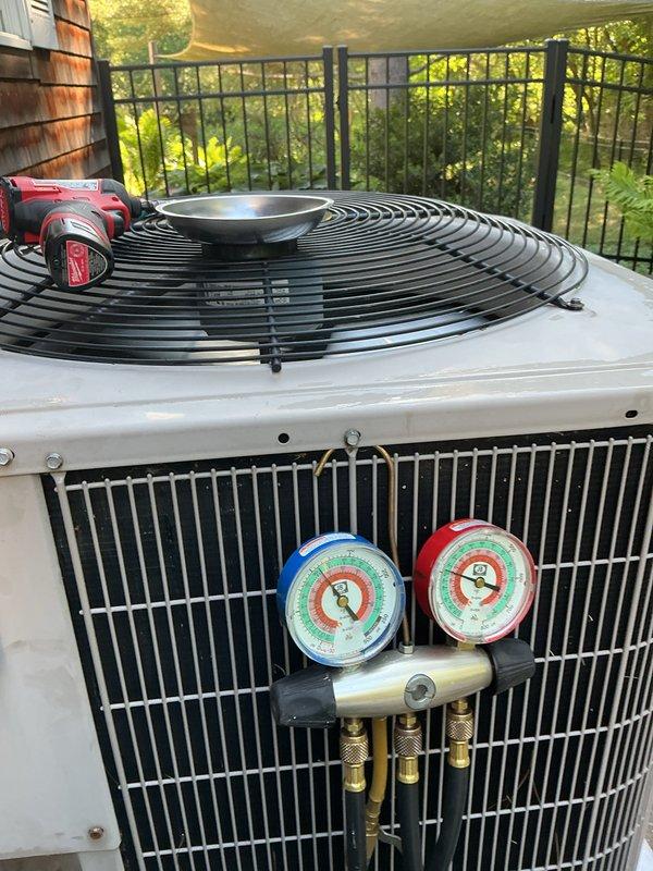 Completed annual cooling maintenance on two HVAC systems. Performed comprehensive inspection of indoor air handler unit, model CNPVP3017ALAAAAA, serial number 2715X29280, utilizing R-410A refrigerant with design pressure rated at 450 PSIG. Conducted refrigerant pressure diagnostics on outdoor condensing unit using manifold gauge set, verifying system pressures and operational parameters. All equipment found operating within manufacturer specifications with no deficiencies identified.
