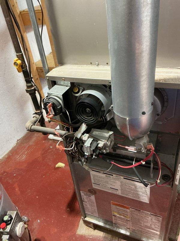 Completed annual maintenance service on HVAC system including heating and cooling units. Performed hot water tank inspection, replaced air filters, and installed new evaporator pads on humidification system. All equipment operating within normal parameters upon completion of service.