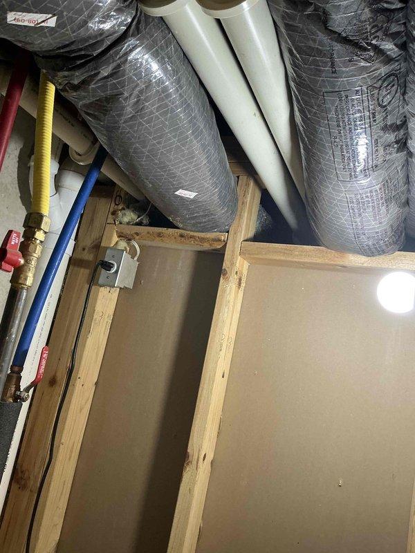 Completed full system estimate for replacement of 20-year-old air conditioning and furnace system that was not blowing cold air. Assessed existing Carrier furnace installation in basement mechanical room along with outdoor AC unit, documented current equipment configuration including ductwork, refrigerant lines, condensate drainage, and venting systems. Provided comprehensive replacement options for complete HVAC system upgrade.