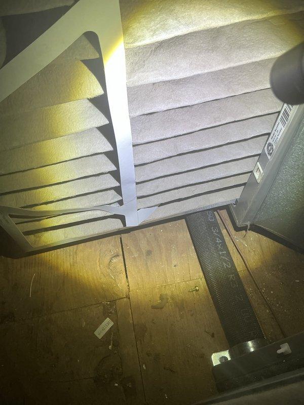 Completed comprehensive Air Handler Check covering both heating and cooling systems for recurring maintenance service. Inspected indoor air handler unit located in attic space, verifying proper operation of all mechanical components, control systems, and airflow distribution. Examined outdoor condensing unit, confirming secure mounting on support brackets, proper clearance from obstructions, and operational status of all exterior components including fan assembly and protective grille. All refrigerant lines, electrical connections, and safety features inspected and found functioning within normal parameters.