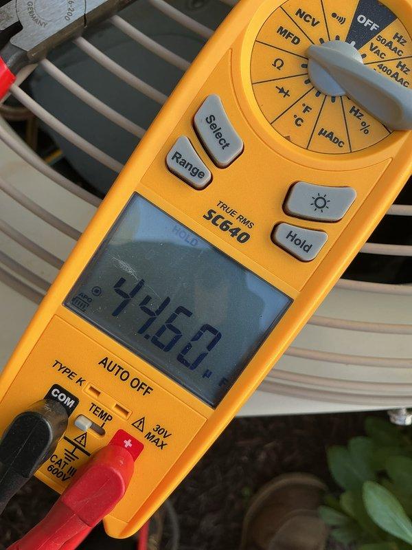 Completed annual Air Care Cooling maintenance on outdoor condensing unit. Performed system inspection, verified electrical readings at 94.60V, checked condenser operation, and documented equipment condition. Unit operating within normal parameters with proper airflow through coil and grille assembly.
