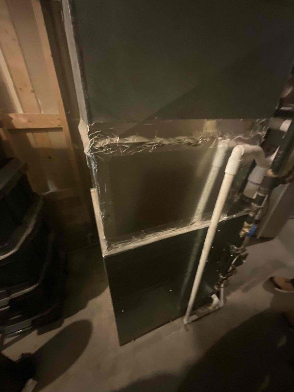 Conducted full system estimate for residential HVAC replacement. Evaluated existing 15-year-old air conditioning system and furnace installation located in basement utility area. Inspected ductwork throughout home including basement air handler connections and attic distribution system. Assessed condition of existing equipment, ductwork integrity, condensate drain lines, electrical connections, and overall system configuration. Documented current installation with photographs showing furnace unit, sheet metal transitions, flexible duct connections, PVC condensate piping, and attic plenum junctions. Provided comprehensive replacement options and recommendations for complete HVAC system upgrade to meet immediate replacement needs.