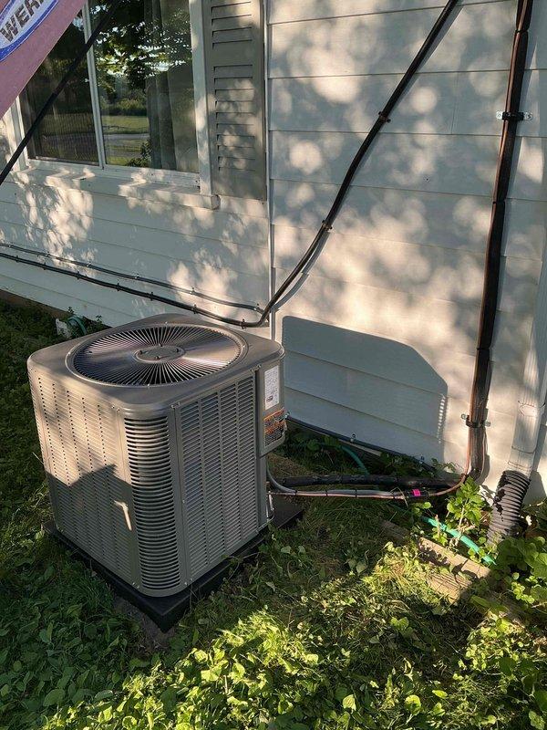 Completed full HVAC system installation including a 70,000 BTU furnace and 2.5-ton air conditioning unit with right-side configuration. Installed new condensing unit on exterior pad with properly insulated refrigerant lines routed and secured along exterior wall. Positioned and connected furnace in attic space with complete ductwork installation including flexible insulated ducts and rigid metal supply trunk lines secured to structural beams. Reconnected all electrical connections and verified proper system operation. Mechanical and electrical permits obtained prior to installation.