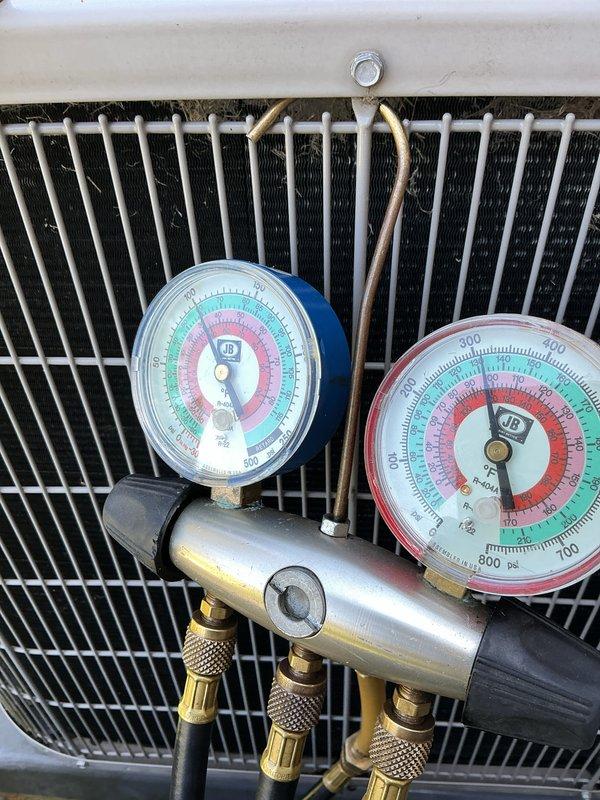 Completed comprehensive AC tune-up and preventive maintenance on 10-year-old air conditioning system. Utilized manifold gauge set and Fieldpiece SC440 digital meter to measure and verify refrigerant pressures and system temperatures, confirming proper operating pressures and temperatures within manufacturer specifications. System found operating properly with no deficiencies noted; all components functioning as designed.