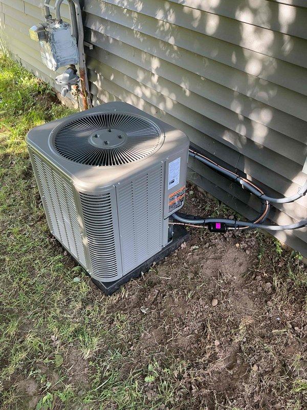 Completed full HVAC system installation including a 70,000 BTU furnace and 1.5-ton air conditioning unit with right-side configuration. Obtained mechanical and electrical permits prior to installation, installed new dedicated electrical circuit for equipment, and positioned Lennox condenser unit on exterior pad with proper refrigerant line routing and electrical conduit connection through building envelope.