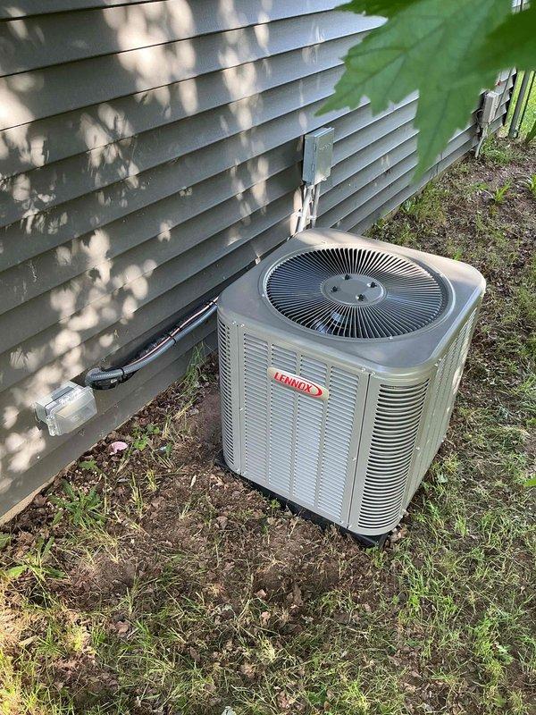 Completed full HVAC system installation including a 70,000 BTU furnace and 1.5-ton air conditioning unit with right-side configuration. Obtained mechanical and electrical permits prior to installation, installed new dedicated electrical circuit for equipment, and positioned Lennox condenser unit on exterior pad with proper refrigerant line routing and electrical conduit connection through building envelope.