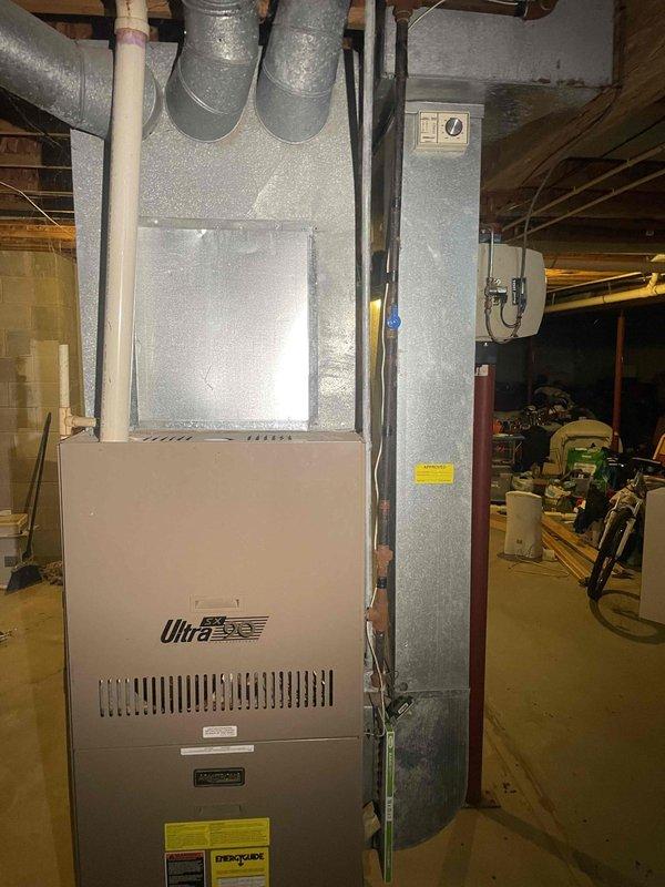 Conducted comprehensive assessment of existing 16-year-old Armstrong Ultra furnace system in basement installation for full HVAC system replacement estimate. Customer requested quote for complete furnace replacement and new air conditioning installation, with project timeline within the next couple weeks. Evaluated current equipment condition, ductwork configuration, electrical service capacity, and installation parameters including existing concrete block support structure and utility room layout. Documented existing system specifications, measured space requirements for new equipment installation, assessed ventilation and condensate drainage routing, and determined compatibility requirements for integrated heating and cooling system. Provided detailed replacement options and specifications for modern high-efficiency furnace and air conditioning system to meet customer's comfort needs.