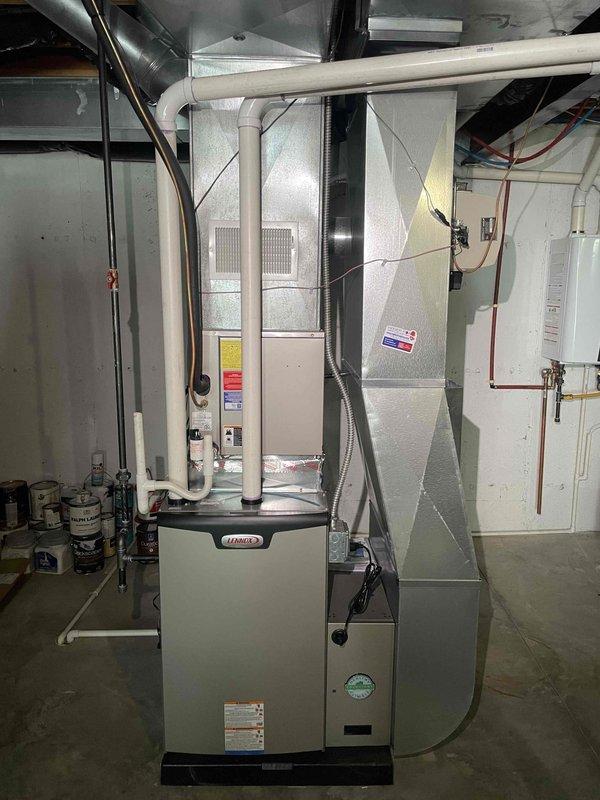 Completed HVAC estimate for replacement of aging air conditioning system experiencing inadequate cooling performance. Assessed existing basement-mounted furnace and outdoor condenser unit, documented current equipment condition and installation configuration including electrical connections, refrigerant lines, and condensate drainage. Provided comprehensive replacement quote for new cooling system to restore proper climate control functionality.