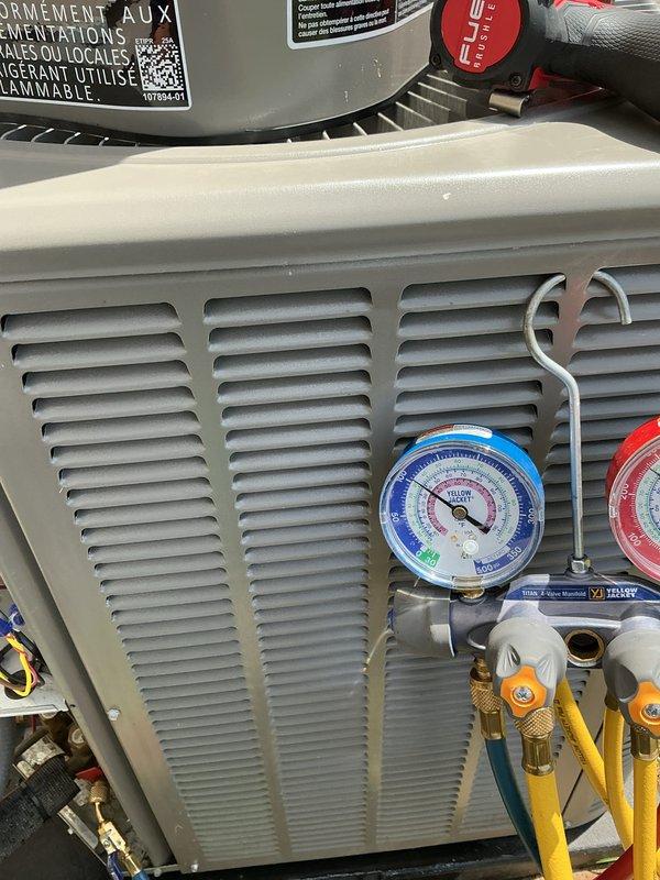 Completed routine Air Care Cooling maintenance on HVAC unit, including system inspection and pressure diagnostics using manifold gauges. Unit assessed with diagnostic equipment showing proper refrigerant levels; all components found to be in operational condition with no immediate service concerns identified.