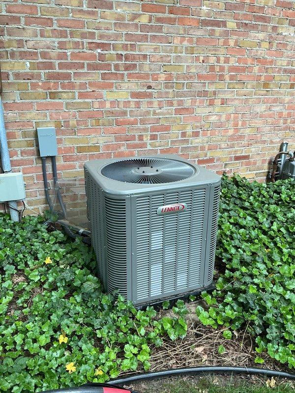 Completed seasonal AC tune-up on Lennox outdoor condensing unit. System operational and functioning properly upon arrival. Performed comprehensive preventative maintenance inspection including checking refrigerant levels, testing electrical connections, cleaning condenser coils, verifying proper airflow through louvers, and confirming fan motor operation. All components operating within normal parameters. System left in excellent working condition.