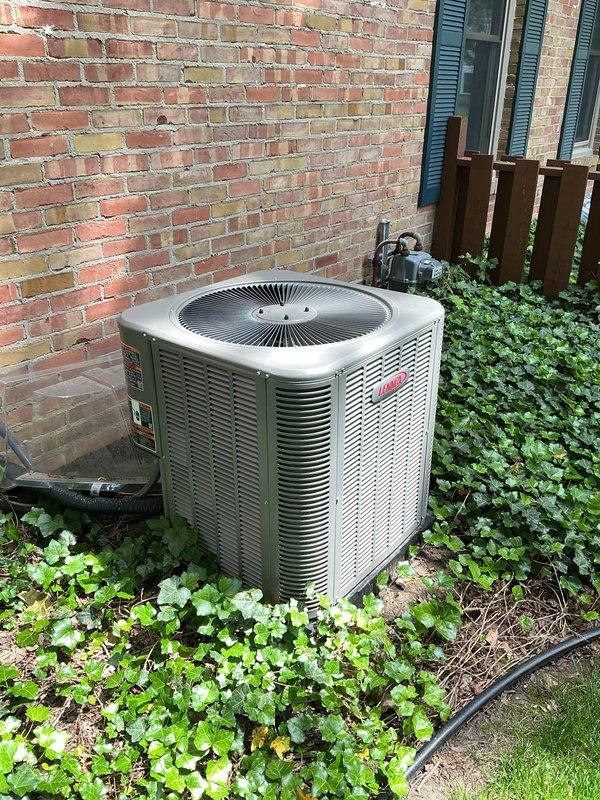Completed seasonal AC tune-up on Lennox outdoor condensing unit. System operational and functioning properly upon arrival. Performed comprehensive preventative maintenance inspection including checking refrigerant levels, testing electrical connections, cleaning condenser coils, verifying proper airflow through louvers, and confirming fan motor operation. All components operating within normal parameters. System left in excellent working condition.