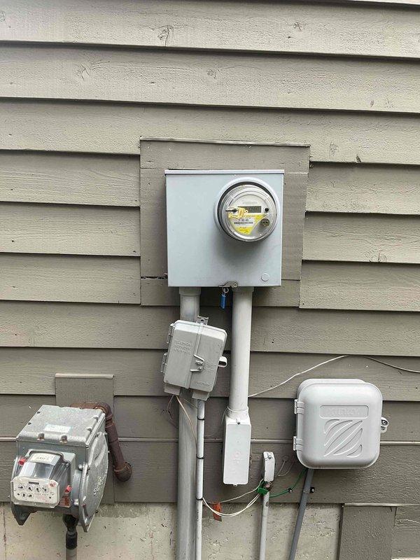 Conducted on-site assessment for replacement estimate of 15+ year old natural gas furnace and air conditioning system located in basement. Evaluated existing HVAC installation including furnace with integrated humidifier, PVC condensate drainage lines, ductwork configuration, and exterior electrical service connections to provide comprehensive equipment replacement recommendations for Air Care Member.