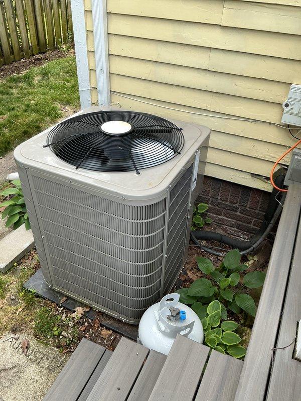 Completed annual cooling maintenance on Bryant residential air conditioning system. Performed comprehensive inspection of outdoor condenser unit including cleaning of coils, verification of refrigerant levels, electrical connections check, and operational testing of fan motor and compressor. Unit operating within normal parameters with no deficiencies noted.