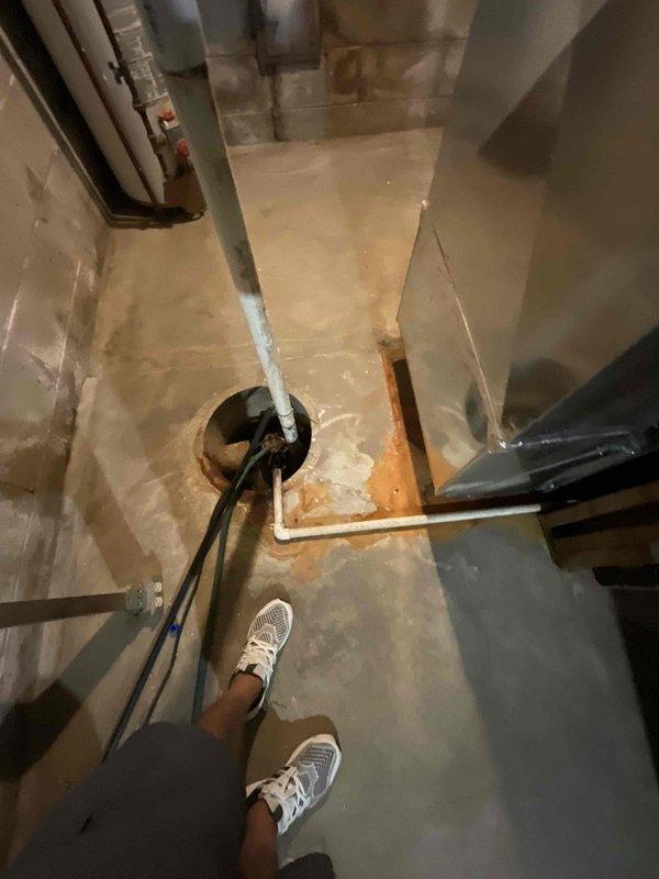 Provided estimate for complete air conditioning system replacement in basement location. Existing 3-year-old AC unit is non-operational and requires full replacement. Assessed basement utility area, evaluated electrical panel capacity for new equipment installation, and documented existing floor penetrations and drainage provisions for proper equipment placement and condensate management.
