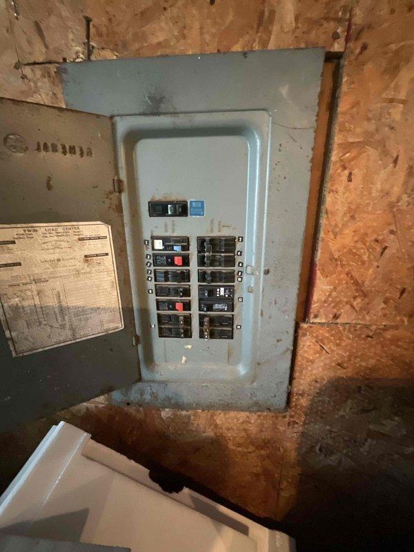 Provided estimate for complete air conditioning system replacement in basement location. Existing 3-year-old AC unit is non-operational and requires full replacement. Assessed basement utility area, evaluated electrical panel capacity for new equipment installation, and documented existing floor penetrations and drainage provisions for proper equipment placement and condensate management.