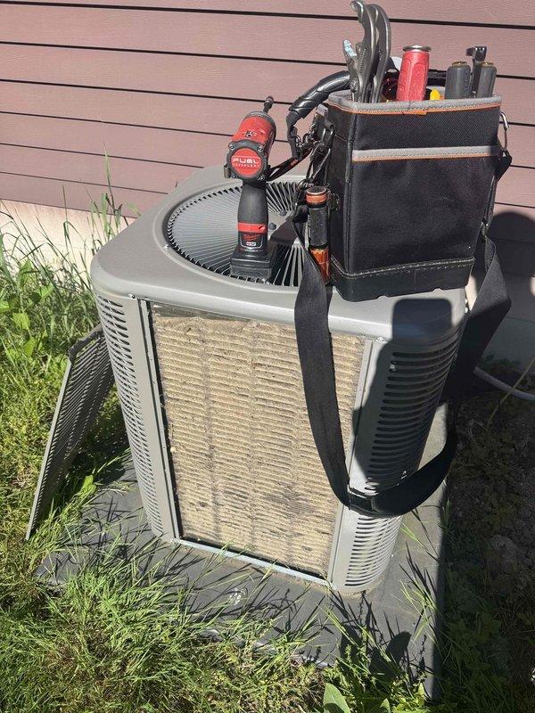Responded to no cooling complaint on 4-year-old Lennox system. Upon arrival, found ice buildup on refrigerant lines at evaporator coil connection, indicating restricted airflow or low refrigerant charge. Thermostat was calling for cooling and indoor blower was operating, but minimal air delivery through supply registers confirmed airflow restriction. Performed system diagnostics using inspection camera to assess evaporator coil condition and verified blower operation. Identified frozen evaporator coil as primary issue preventing proper cooling. System shut down to allow coil to thaw completely before proceeding with further diagnostics to determine root cause of icing condition, whether due to dirty filter, blocked return air, low refrigerant charge, or failed blower motor capacitor.