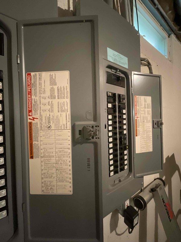 Conducted on-site electrical assessment for Tesla EV charger installation at 25-year-old residential property. Evaluated existing electrical panel capacity, available breaker spaces, and determined routing requirements from main service panel through unfinished basement area to proposed charging station location. Documented current electrical infrastructure and provided estimate for dedicated 240V circuit installation to support Level 2 EV charging equipment.