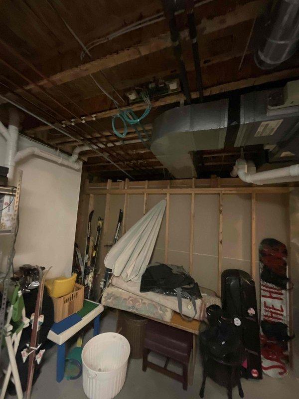 Conducted on-site electrical assessment for Tesla EV charger installation at 25-year-old residential property. Evaluated existing electrical panel capacity, available breaker spaces, and determined routing requirements from main service panel through unfinished basement area to proposed charging station location. Documented current electrical infrastructure and provided estimate for dedicated 240V circuit installation to support Level 2 EV charging equipment.