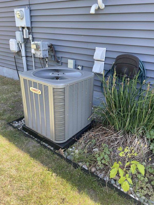 Completed full HVAC system installation including a 70,000 BTU furnace and 2.5 ton Lennox air conditioning unit with left-side configuration. Obtained mechanical permits prior to installation. Successfully installed outdoor condenser unit on pad against exterior wall with proper electrical disconnect and condensate drainage. Reconnected all necessary utility connections and verified system operation upon completion.