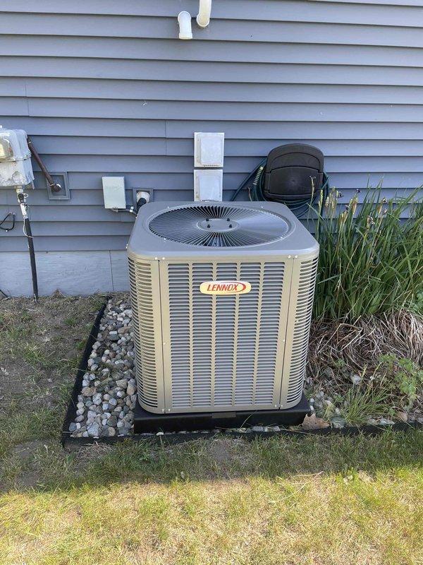 Completed full HVAC system installation including a 70,000 BTU furnace and 2.5 ton Lennox air conditioning unit with left-side configuration. Obtained mechanical permits prior to installation. Successfully installed outdoor condenser unit on pad against exterior wall with proper electrical disconnect and condensate drainage. Reconnected all necessary utility connections and verified system operation upon completion.