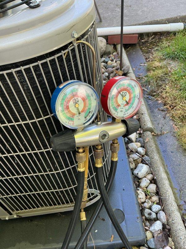 Completed annual cooling maintenance on residential air conditioning system. Connected manifold gauge set to measure refrigerant pressures and verified system operating within manufacturer specifications. Performed standard ACM protocol including inspection of condenser unit, coils, and electrical components. Reminded customer to schedule annual heating maintenance and future air conditioning maintenance appointments.