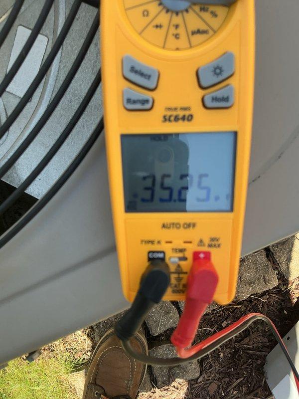 Completed annual cooling maintenance on residential air conditioning system. Performed comprehensive inspection of outdoor condenser unit, including electrical testing with multimeter showing proper voltage readings at 35.5 volts for control circuit. Verified refrigerant line connections, inspected fan motor operation, and confirmed unit cycling properly. All components found operating within normal parameters with no repairs required at this time.