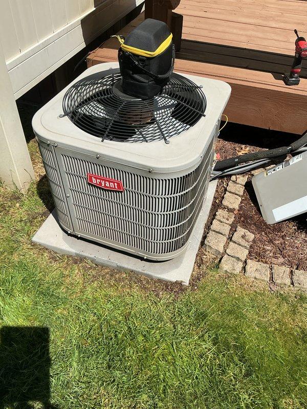 Completed annual cooling maintenance on residential air conditioning system. Performed comprehensive inspection of outdoor condenser unit, including electrical testing with multimeter showing proper voltage readings at 35.5 volts for control circuit. Verified refrigerant line connections, inspected fan motor operation, and confirmed unit cycling properly. All components found operating within normal parameters with no repairs required at this time.