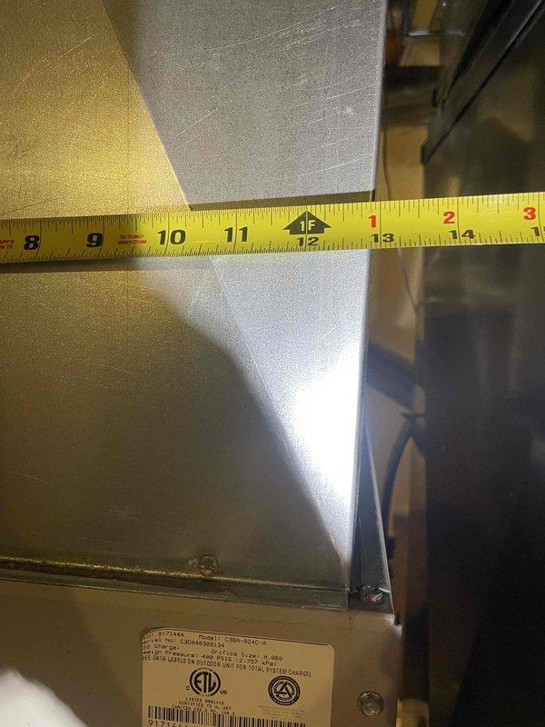 Performed comprehensive assessment of failed 15-20 year old 2-ton air conditioning system located in basement of 1300 square foot townhome. Conducted measurements of existing equipment and ductwork to determine proper sizing and compatibility for replacement options. Provided estimate options for air conditioning unit replacement only, as well as combined furnace and air conditioning system replacement, recommending Lennox equipment with 2-ton capacity, 2-stage compressor, and approximately 16-17 SEER efficiency rating to meet cooling requirements.