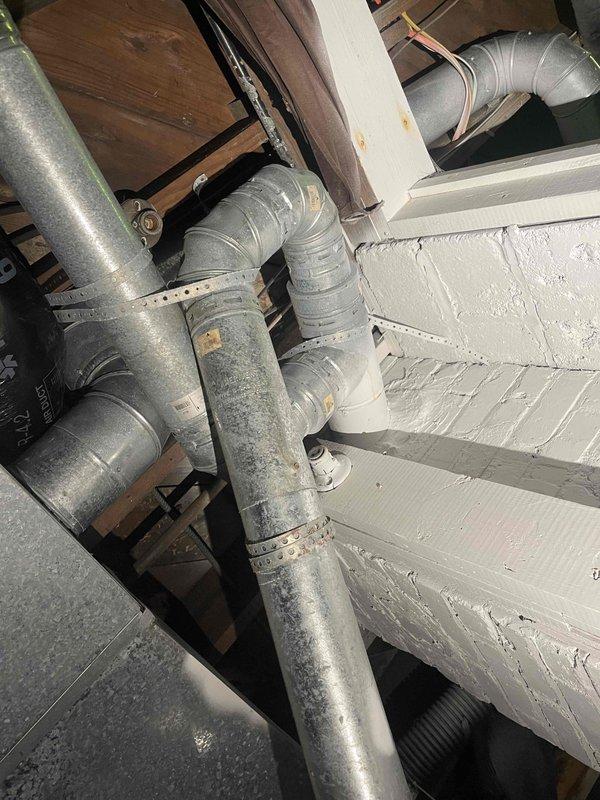 Completed estimate consultation for furnace replacement at previously vacant residential property. Inspected existing HVAC system in basement utility area, documented aged furnace unit with no operational history for past year, assessed ductwork configuration including galvanized metal supply ducts and flexible return connections, and evaluated overall system layout for replacement planning. Provided replacement options and recommendations based on current equipment condition and home heating requirements.