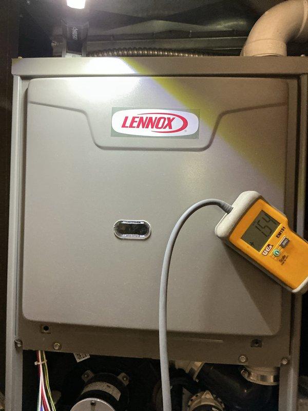 Completed comprehensive ComfortGuard Maintenance Package on four-year-old Lennox furnace and air conditioning system. Performed full AC tune-up on outdoor condenser unit, including inspection of fan motor, compressor operation, refrigerant levels, electrical connections, and capacitor testing. Cleaned condenser coils and removed debris accumulation from exterior cabinet panels. Conducted indoor furnace inspection, verifying blower motor operation, heat exchanger integrity, gas valve function, and ignition system performance. Tested all safety controls, measured temperature rise across heat exchanger, and verified proper airflow throughout system. Replaced air filter and documented system operating pressures and temperatures. Both heating and cooling systems operating within manufacturer specifications with no immediate repairs required. Recommended exterior cabinet cleaning for condenser unit to prevent corrosion and maintain efficiency. All diagnostic measurements recorded using calib