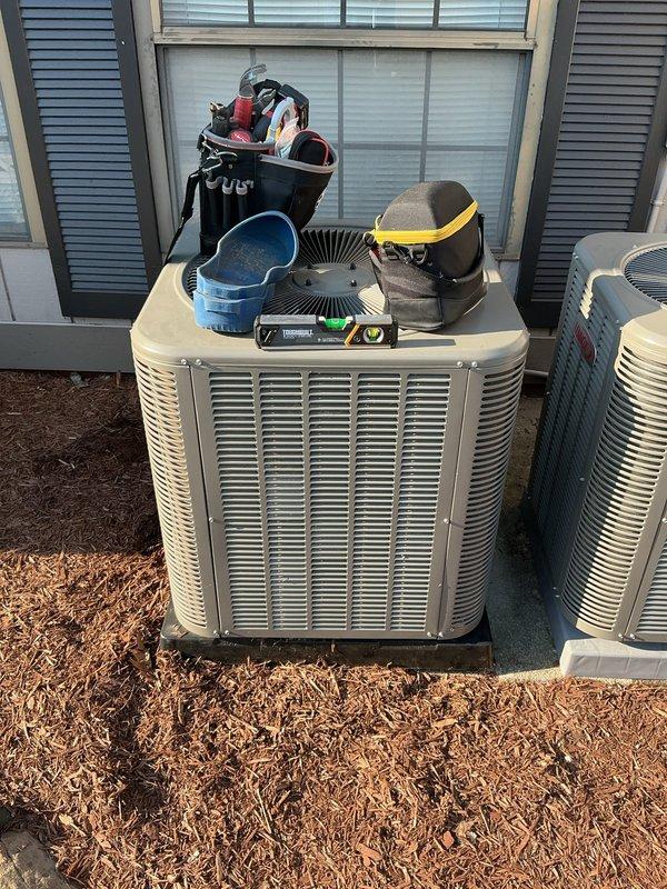Responded to service call regarding outdoor condenser unit that was reportedly displaced from its original mounting blocks by neighboring HVAC installation crew. Performed thorough inspection of 1-year-old unit to assess potential damage from movement. Examined refrigerant line connections, electrical connections, mounting stability, and cabinet integrity. Verified unit levelness and proper positioning on pad. Documented current condition with photographs showing unit placement and surrounding equipment. Unit found to be operational with both parts and labor warranty active. Completed visual inspection and diagnostic assessment of system components.