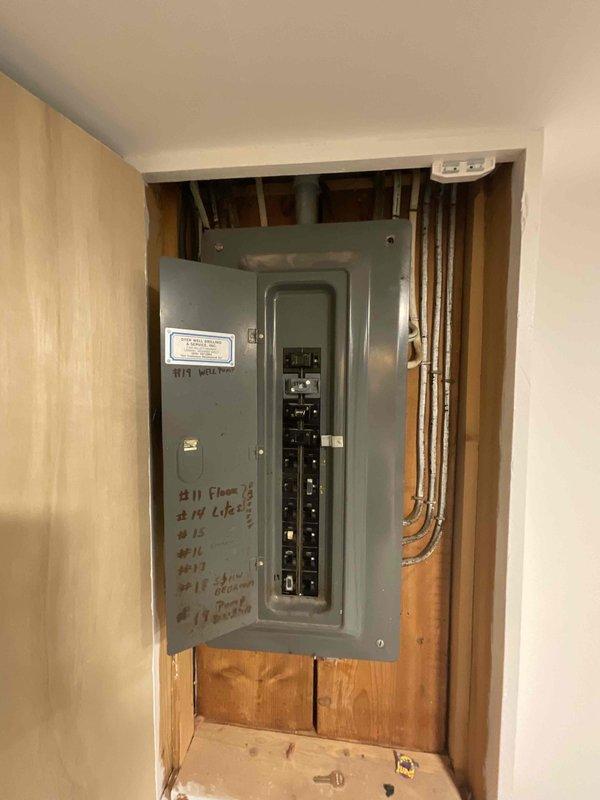 Conducted on-site evaluation for new whole home generator installation at a manufactured home. Assessed existing electrical panel configuration, available space in utility closet, and determined load requirements based on current 200-amp service with dual-column circuit breaker arrangement. Documented panel location, copper conduit routing, and identified optimal transfer switch placement for future generator integration with main electrical system.