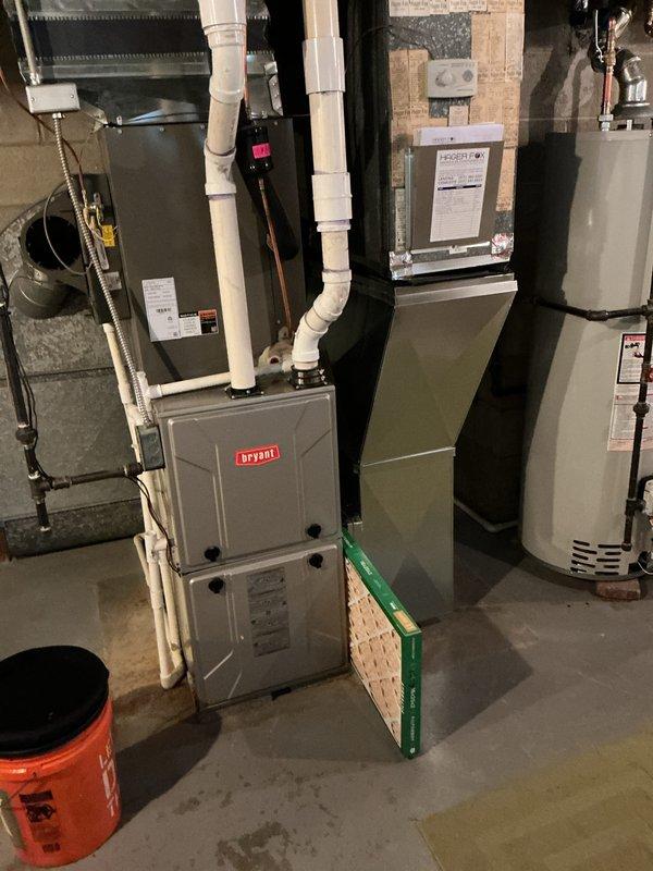 Completed annual cooling maintenance on residential HVAC system. Inspected Bryant furnace and air handler unit, replaced air filter and evaporator pads as scheduled. System operating within normal parameters, all components functioning properly.