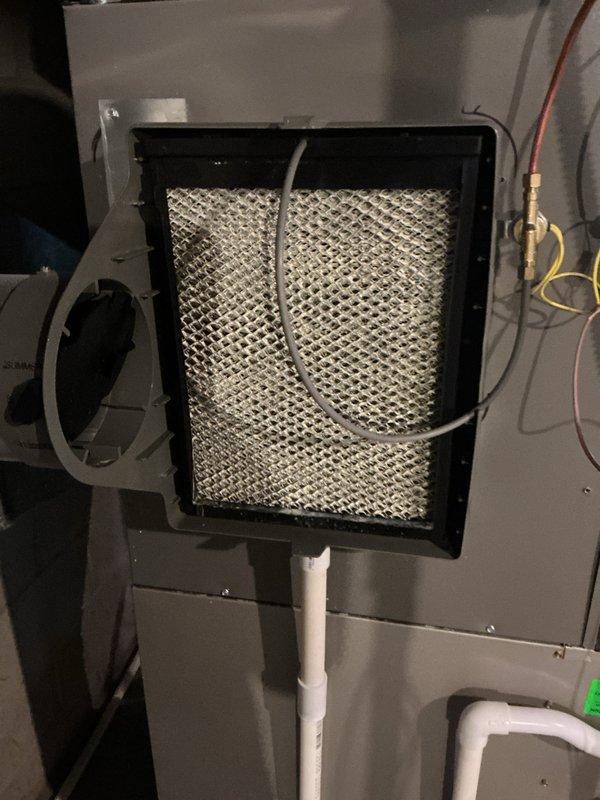Completed annual cooling maintenance on residential HVAC system. Inspected Bryant furnace and air handler unit, replaced air filter and evaporator pads as scheduled. System operating within normal parameters, all components functioning properly.
