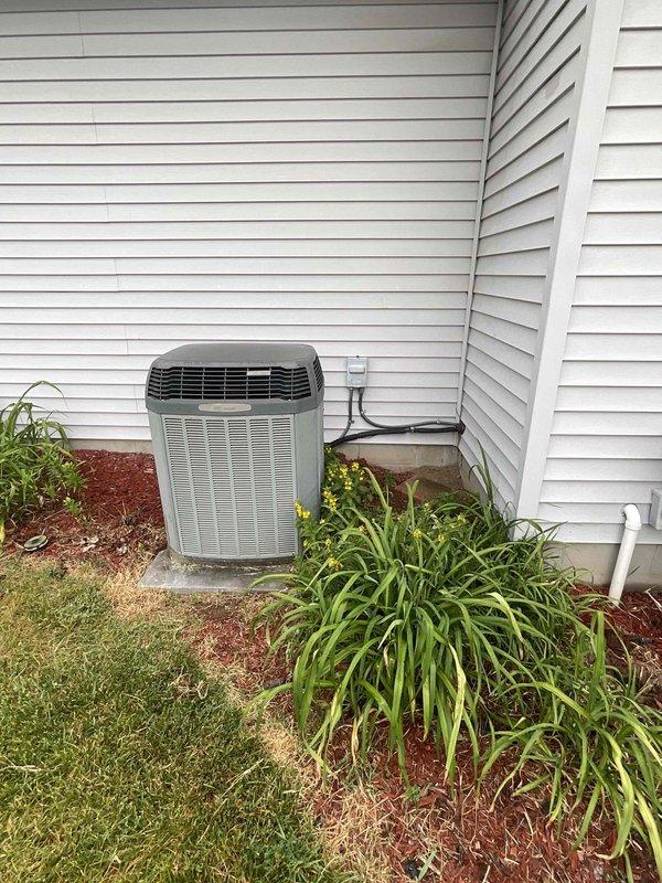 Conducted comprehensive assessment of existing HVAC system for full replacement estimate. Evaluated 20-year-old outdoor air conditioning unit positioned on concrete pad with existing refrigerant lines, electrical disconnect, and condensate drainage system. Inspected basement furnace installation including ductwork configuration, supply and return air distribution, and current system layout. Documented equipment conditions, existing infrastructure, and installation requirements for proposed furnace and air conditioner replacement with priority given to air conditioning system replacement.