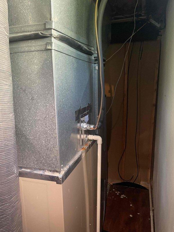 Conducted comprehensive evaluation of existing HVAC system for full replacement estimate. Assessed current air handler unit installed in utility closet and documented equipment configuration including ductwork connections, condensate drainage, and electrical components. Photographed existing mechanical installations to provide accurate system specifications for replacement proposal.